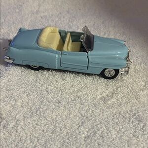 Light Blue Convertible Toy Car